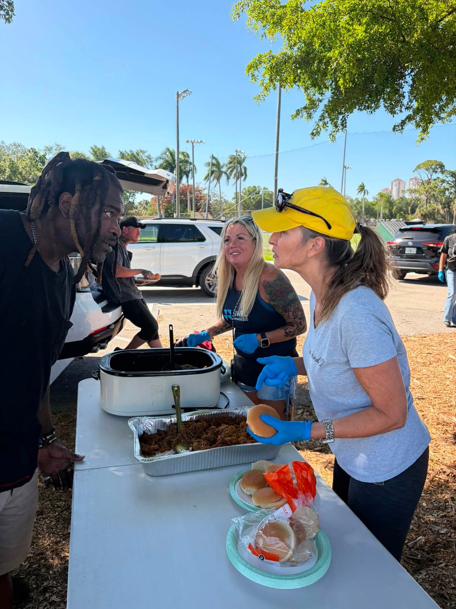 Volunteer serving a community member