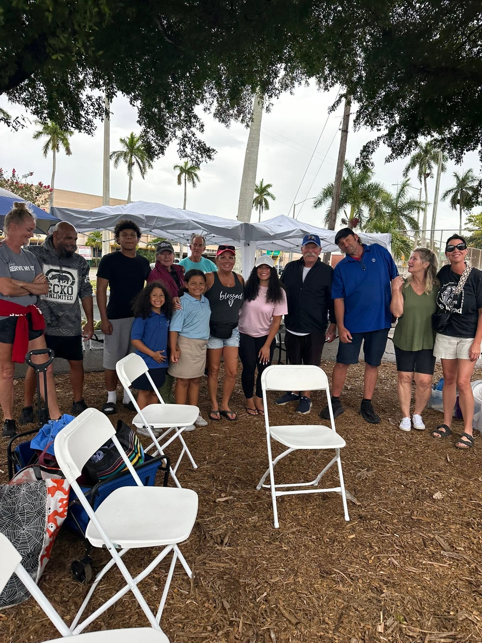 Faith Defenders volunteers distributing clothing and supplies